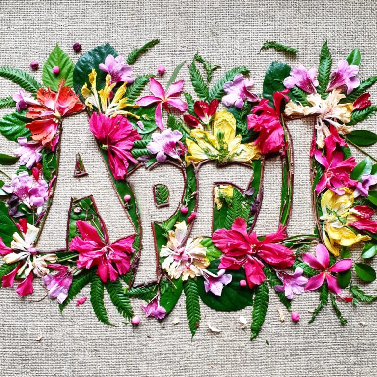 April,creative text made with colourful flowers
