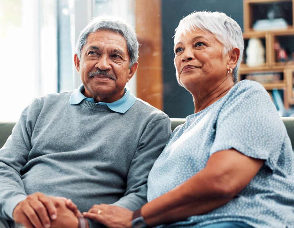 Nurse, tablet and healthcare with old couple, home and support with medical professional. Discussion, insurance or life cover with mature man, woman and meeting for consultation and communication